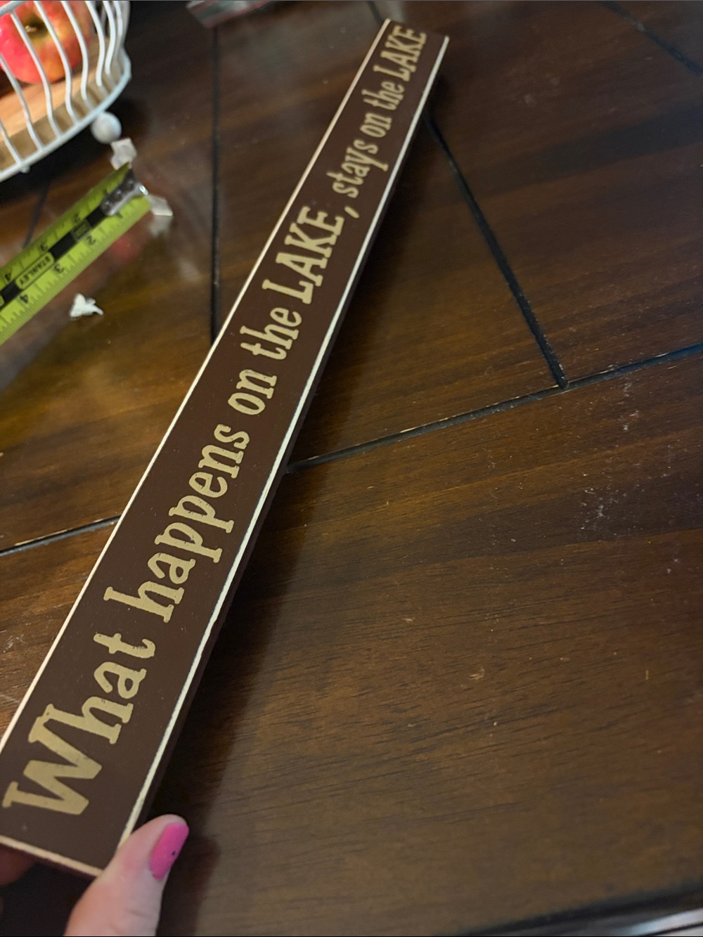 Brown "What Happens on the Lake" Rustic Wooden Sign